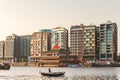 View at the contemporary Amsterdam Oosterdok with a small barge