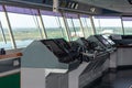 View of the control console on the navigational bridge of the cargo container ship. Royalty Free Stock Photo