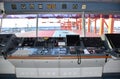 View of the control console on the navigational bridge of the cargo ship.