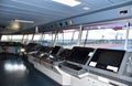 View of the control console on the navigational bridge of the cargo ship. Royalty Free Stock Photo