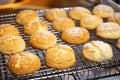 view of a cooling rack filled with fresh biscuits