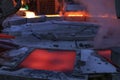 View of the copper casting to the molds in the smelting of the industrial plant. Smelting is a process of applying heat.