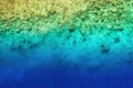 View on the coral reef. Azure water background from top view. Summer seascape from air. Royalty Free Stock Photo