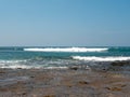 View of the coral reef of Hikkaduwa beach in the Indian Ocean. Copy space. Hikkaduwa, Sri Lanka Royalty Free Stock Photo