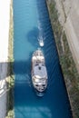 View of the Corinth Canal Peloponnese, Greece from the bridge and a ship sailing on it Royalty Free Stock Photo