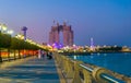 View of the corniche - promenade in Abu Dhabi during sunset, UAE Royalty Free Stock Photo