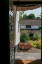 Garden view from an old country cottage door. Royalty Free Stock Photo