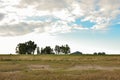 View of a country house with trees and barbed wire Royalty Free Stock Photo