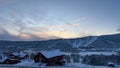 View of countryside buildings in the snow-covered landscape of Geilo