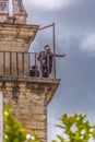 View of a Couple of tourists on the balcony of the Royal Palace of Coimbra, dazzling view of the city of Coimbra Royalty Free Stock Photo