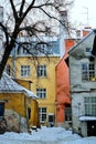 View of a courtyard with ancient houses on a cloudy winter day