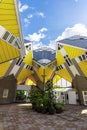 View of the courtyard of the famous yellow cube houses, with their uneven doors, windows, floors and walls, designed by architect