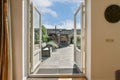 a view of the courtyard from a open door Royalty Free Stock Photo