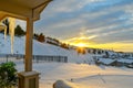 Winter sunset from a hillside home in the snow Royalty Free Stock Photo