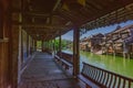 Covered street by river and houses, in the old town of Wuzhen, China Royalty Free Stock Photo