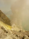 View on the crater of the Ijen volcano in Indonesia, a sulfur mine and toxic gaz Royalty Free Stock Photo