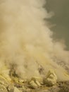 View on the crater of the Ijen volcano in Indonesia, a sulfur mine and toxic gaz Royalty Free Stock Photo