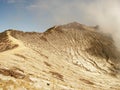 View on the crater of the Ijen volcano in Indonesia, a sulfur mine and toxic gaz Royalty Free Stock Photo