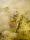 View on the crater of the Ijen volcano in Indonesia, a sulfur mine and toxic gaz Royalty Free Stock Photo