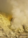 View on the crater of the Ijen volcano in Indonesia, a sulfur mine and toxic gaz Royalty Free Stock Photo