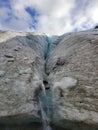 View of crevice of glacier that pours down into wedgemount lake