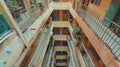 View of crowded atrium inside old residential building in hong kong city, urban architecture