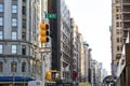 View of crowded city streets looking down Broadway from the intersection of 8th Street in Manhattan, New York City