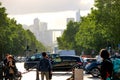 View of a crowdy Business District in Paris, France surrounded by trees in a day time