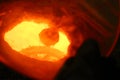 View into a crucible of molten metal.