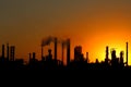 View of crude oil refinery factory during sunset