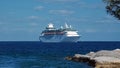View of Cruise Ship Anchored off Island Shore Royalty Free Stock Photo