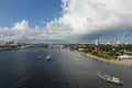 The view from a cruise ship of Port Everglades, in Ft. Lauderdale, Florida of the channel out to the ocean with a luxury yacht Royalty Free Stock Photo