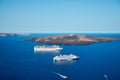 Volcanic island and cruise ships, Santorini, Greece Royalty Free Stock Photo
