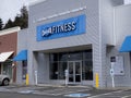 Redmond, WA USA - circa April 2021: View of a Crunch Fitness center in a strip mall area