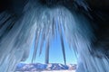 Crystal Blue Ice Icicles Inside Frozen Ice Cave at Lake Baikal in Winter