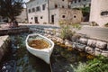 Rustic vintage antique boat docked in old bay Royalty Free Stock Photo