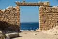 View of the crystalline water behaind the ruins on the Milos island