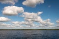 A view of cumulus clouds and New River Lagoon located east of the Maya Temples of Lamanai