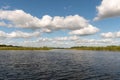 A view of cumulus clouds and New River Lagoon located east of the Maya Temples of Lamanai