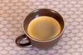 Cup of black coffee isolated on a table Royalty Free Stock Photo