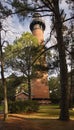 A View of Currituck Beach Lighthouse through the Trees Royalty Free Stock Photo