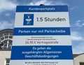 View on customer parking sign with 1,5 hours time limit with disc and advice for fine payment