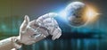 Cyborg hand holding a Earth globle particles 3d rendering Royalty Free Stock Photo
