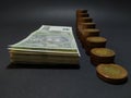 View of Czech coins stacked next to each other next to a pile of Czech banknotes, Czech fifty crown coins, Czech two thousand Royalty Free Stock Photo