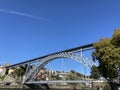 View of D. Luis bridge against the background of blue sky. Porto, Portugal.