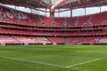 View of Da Luz Stadium: Red Empty Seating and Green Soccer Pitch