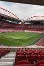 View of Da Luz Stadium: Red Empty Seating and Green Soccer Pitch Royalty Free Stock Photo