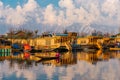 View of  Dal lake  and boat house before sunset in the heart of Srinagar during winter  , Srinagar , Kashmir , India Royalty Free Stock Photo