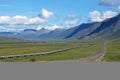 View of Dalton Highway with oil pipeline, leading from Valdez, Fairbanks to Prudhoe Bay, Alaska, USA