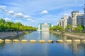 View of Dambovita river and National Library in a sunny spring day - Bucharest, Romania - 20.05.2019 Royalty Free Stock Photo